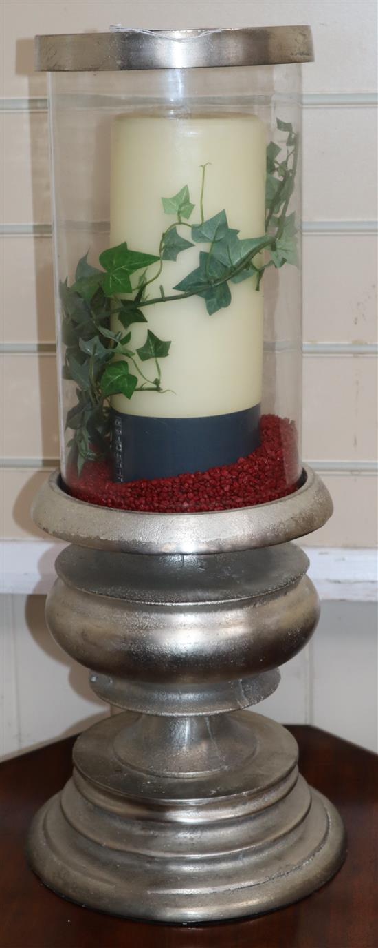 A silvered metal storm light height 57cm